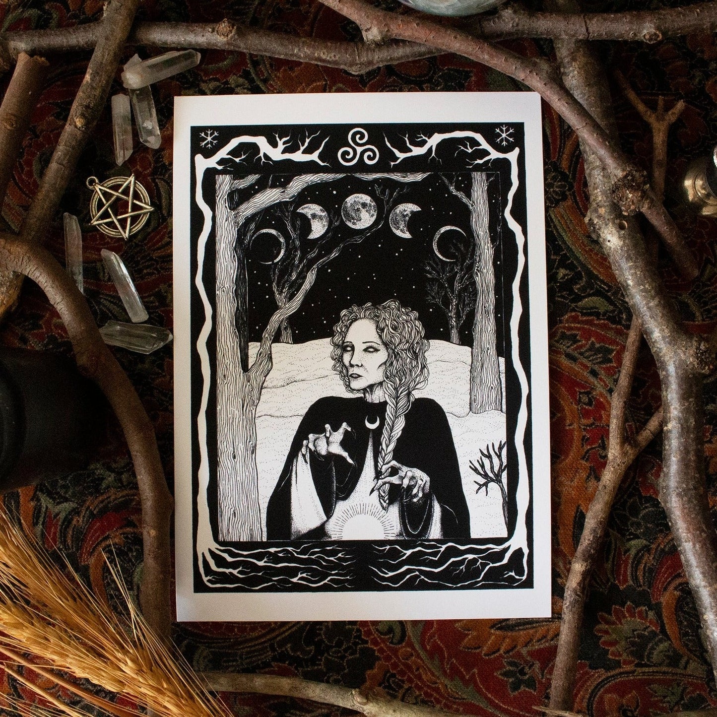An image of a crone casting a spell with the phases of the moon spread across behind her